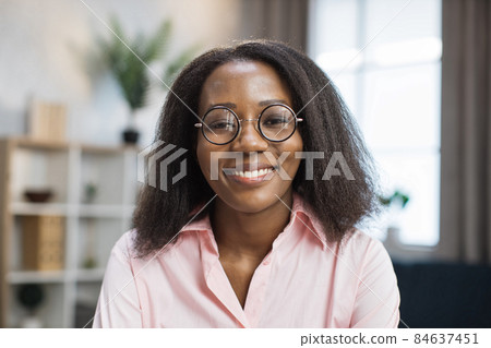 African american woman in eyeglasses smiling on camera 84637451