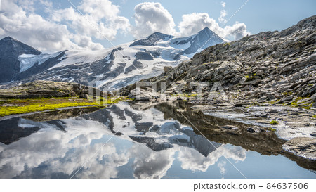 Mountain glacier reflection in Austrian Alps 84637506