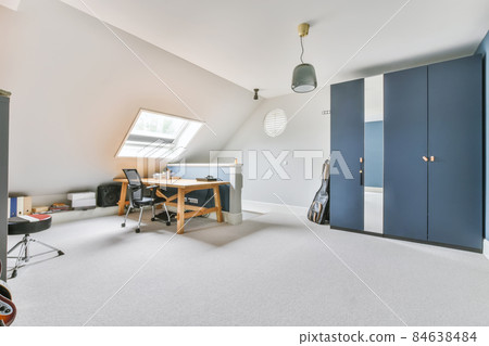 Attic studio room in white and blue colors 84638484