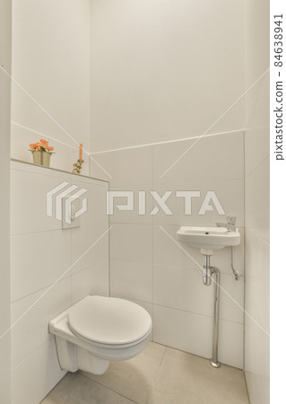 Interior of small clean restroom in miniature style 84638941
