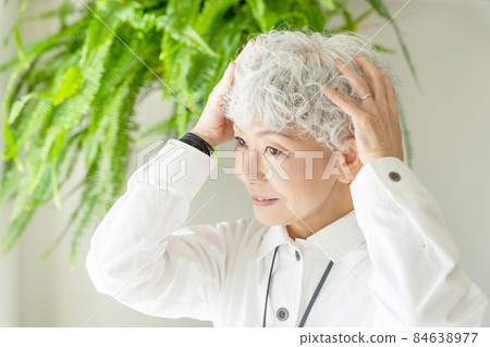Gray hair senior female hair care image 84638977