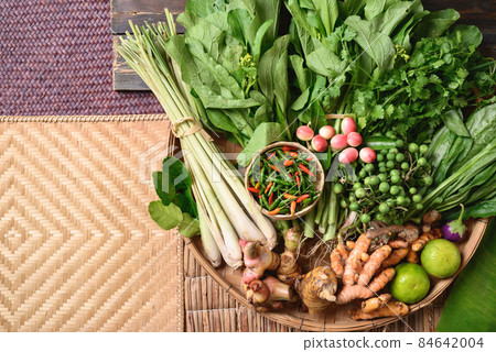Fresh organic Southeast Asian vegetables and spices from local farmer market, Northern of Thailand 84642004