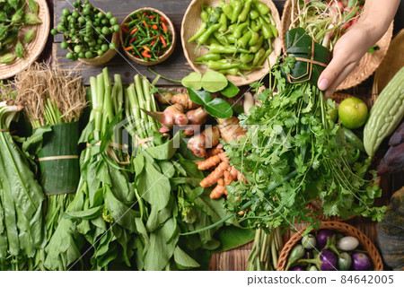 Fresh organic Southeast Asian vegetables and spices from local farmer market, Northern of Thailand 84642005