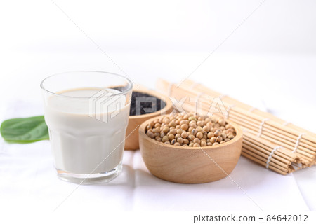 Soy milk with black sesame on white background, Healthy drink Soy milk with black sesame on white background, Healthy drink 84642012