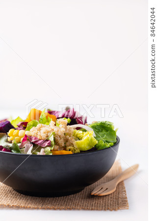 Fresh organic vegetables salad with quinoa seed in bowl on white background, Healthy Vegan food Fresh organic vegetables salad with quinoa seed in bowl on white background, Healthy Vegan food 84642044