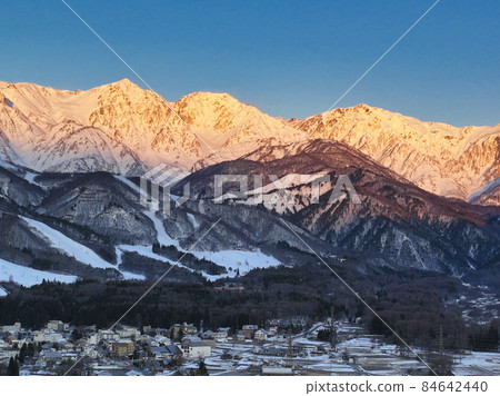 Beautiful Morgen Lot in the Hakuba Mountain Range and a magnificent view of Happoone and Hakuba Village Hakuba Village, Nagano Prefecture (aerial view by drone) Beautiful Morgen Lot in the Hakuba Mountain Range and a magnificent view of Happoone and Hakuba Village Hakuba Village, Nagano Prefecture (aerial view by drone) 84642440