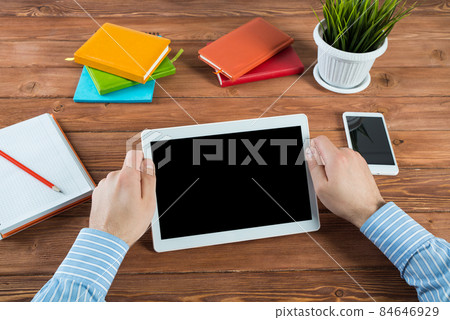 businessman with a tablet, works in the office businessman with a tablet, works in the office 84646929