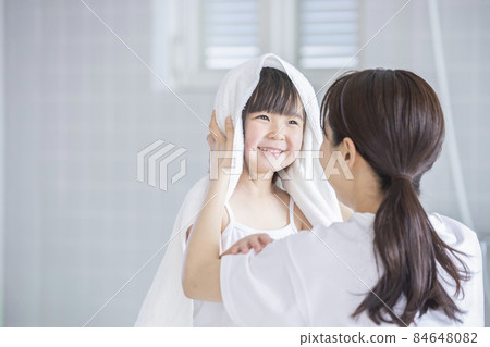 Girl doing towel drying 84648082