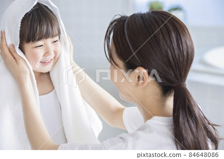Girl doing towel drying 84648086