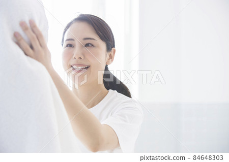 Mother doing towel drying 84648303