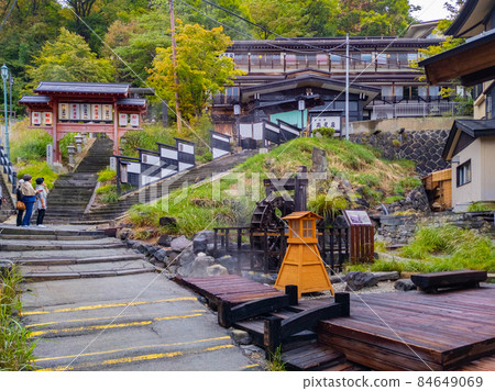 Oyu and water wheel in front of a quaint hot spring inn (Zao Onsen, Yamagata Prefecture) Oyu and water wheel in front of a quaint hot spring inn (Zao Onsen, Yamagata Prefecture) 84649069