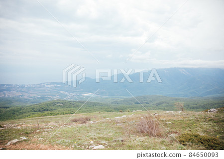 beautiful landscape on top of the mountain view of the forest and sky 84650093