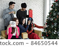 Selfie of group young Asian with gifts at home in celebrating Christmas festival. 84650544