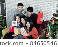 Selfie of group young Asian with gifts at home in celebrating Christmas festival. 84650546