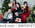 Group young Asian with gifts at home in celebrating Christmas festival. 84650547