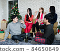 Funny party of young Asian with clink glasses and drank wine in celebrate Christmas festival. 84650649