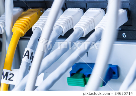 close-up of ethernet cables and switch 84650714