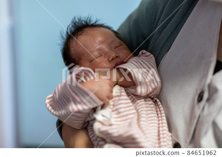 Breastfeeding mom and 1 month old baby Breastfeeding mom and 1 month old baby 84651962