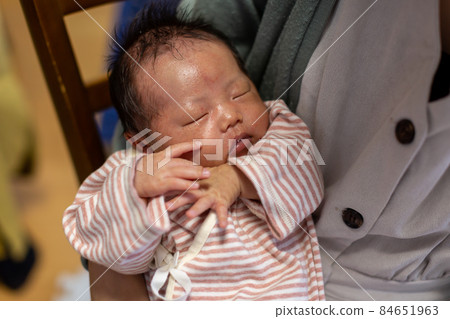 Breastfeeding mom and 1 month old baby Breastfeeding mom and 1 month old baby 84651963