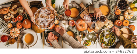 People feasting at autumn festive table, top view 84652768
