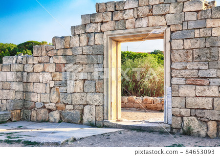 Fantastic sunset over ruins of the Basilica in ancient city Chersonese - national historical and archaeological reserve. 84653093