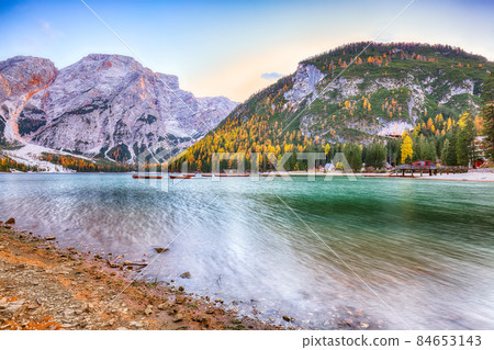 Outstanding scenery of famous alpine lake Braies at autumn. 84653143