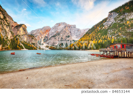 Astonishing scenery of famous alpine lake Braies at autumn. Astonishing scenery of famous alpine lake Braies at autumn. 84653144