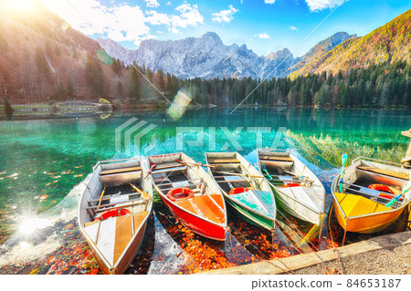 Marvelous view of sunset over Fusine lake with Mangart peak on background 84653187