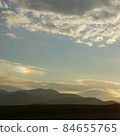 A rainbow-colored sun dog that appeared in the evening sky 84655765