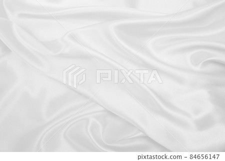 Smooth elegant white silk or satin luxury cloth texture as wedding background. Luxurious background design 84656147