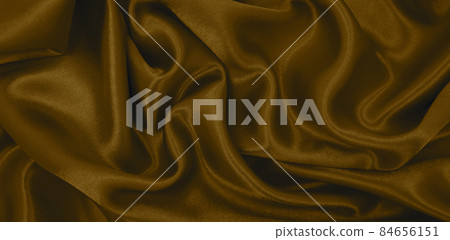 Smooth elegant brown silk or satin luxury cloth texture as abstract background. Luxurious background design wallpaper. In Sepia toned. Retro style Smooth elegant brown silk or satin luxury cloth texture as abstract background. Luxurious background design wallpaper. In Sepia toned. Retro style 84656151