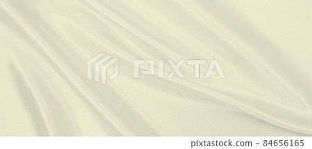 Smooth elegant golden silk or satin luxury cloth texture as wedding background. Luxurious background design. In Sepia toned. Retro style Smooth elegant golden silk or satin luxury cloth texture as wedding background. Luxurious background design. In Sepia toned. Retro style 84656165