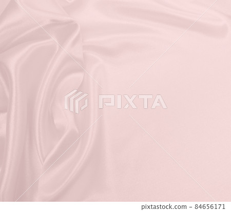 Smooth elegant pink silk or satin texture as wedding background. Luxurious background design 84656171
