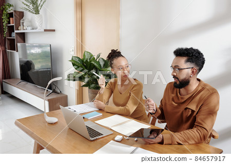 Business Couple Discussing Problems 84657917