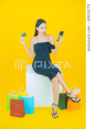 Portrait beautiful young asian woman smile with shopping bag 84658279