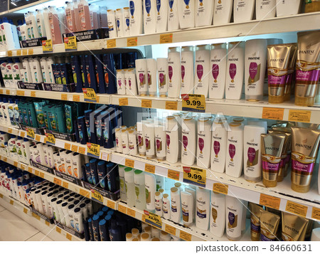 SELANGOR, MALAYSIA -JUNE 9, 2020: Selected focused on the hair shampoo in plastic bottle packaging, on display for sale on the shelves in the supermarket. Tagged with the price tag. SELANGOR, MALAYSIA -JUNE 9, 2020: Selected focused on the hair shampoo in plastic bottle packaging, on display for sale on the shelves in the supermarket. Tagged with the price tag. 84660631