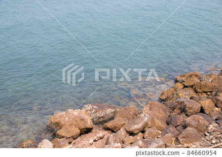 sea and beach with stone at coast 84660954