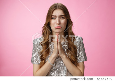 Please beg you. Clingy silly miserable supplicating young cute female curly-haired praying whining about cry press palms together asking please do favor need help, standing pink background Please beg you. Clingy silly miserable supplicating young cute female curly-haired praying whining about cry press palms together asking please do favor need help, standing pink background 84667329