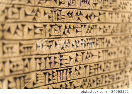 Babylonian historical writing background. Ancient hieroglyphs of the Sumerian and Babylonian civilizations. Archaeological objects and antiquities 84668331