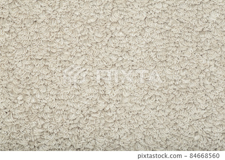 Beige carpet background. Gray carpet with texture on the surface. Materials and items for interior design of rooms and houses Beige carpet background. Gray carpet with texture on the surface. Materials and items for interior design of rooms and houses 84668560