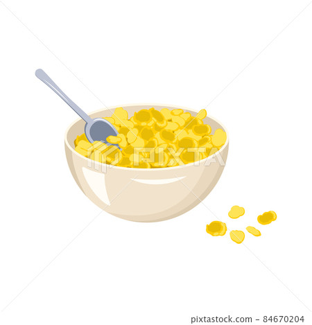A bowl of cornflakes and a spoon. Fast food breakfast or snack. Delicious sweet corn product. A bowl of cornflakes and a spoon. Fast food breakfast or snack. Delicious sweet corn product. 84670204