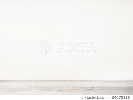 Empty white wood table top and blur wall. Wall Texture Background. Building banner mock up abstract background - can used for display or montage your products. Empty white wood table top and blur wall. Wall Texture Background. Building banner mock up abstract background - can used for display or montage your products. 84670518