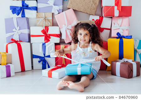 little curly girl opens birthday gifts of 5 years little curly girl opens birthday gifts of 5 years 84670960