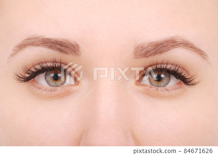 Beautiful woman eyes with long eyelashes. Studio shot Beautiful woman eyes with long eyelashes. Studio shot 84671626