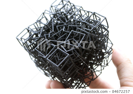 Man holding plastic model printed on powder 3d printer from polyamide powder. 84672257