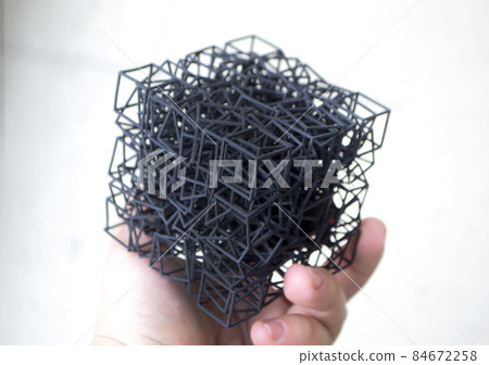 Man holding in hand model printed on 3D printer Multi Jet Fusion MJF 3D printing Man holding in hand model printed on 3D printer Multi Jet Fusion MJF 3D printing 84672258