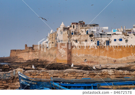View of the old fortress of Essaouira on a sunny summer day at Essaouira, Morocco View of the old fortress of Essaouira on a sunny summer day at Essaouira, Morocco 84672578