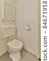 Interior of small clean restroom in miniature style 84673958