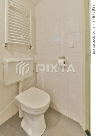 Interior of small clean restroom in miniature style 84673958