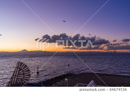 A distant view of Mt. Fuji through a huge object of Umihotaru PA in Tokyo Bay 84674536